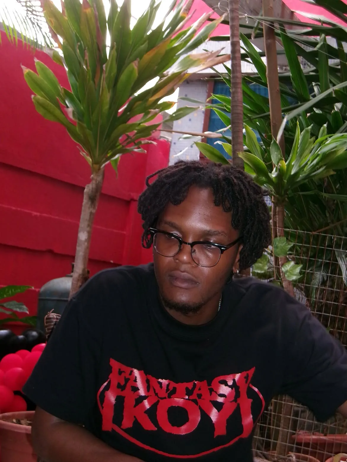 A guest in glasses at the gathering
