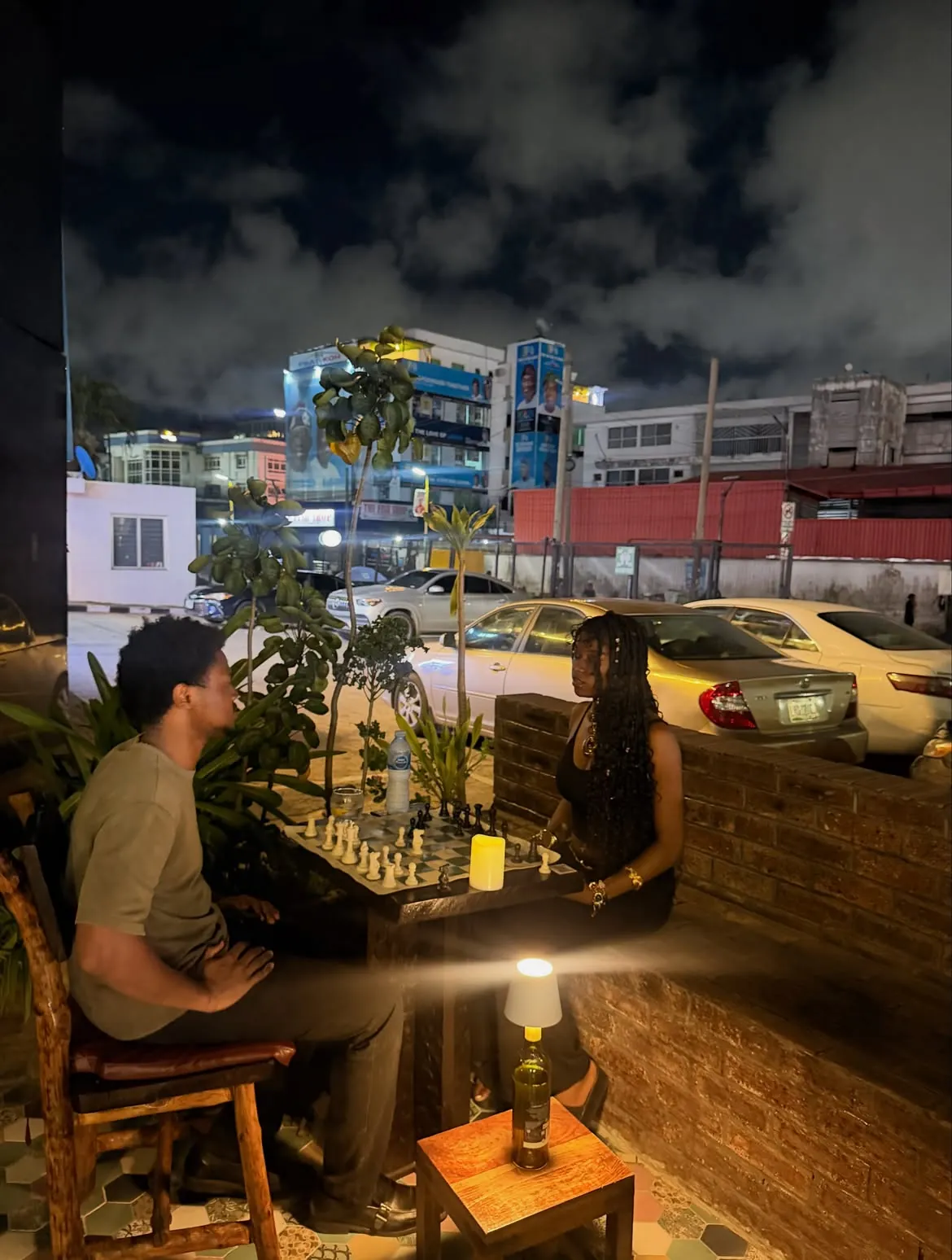 A chess table on the terrace at night